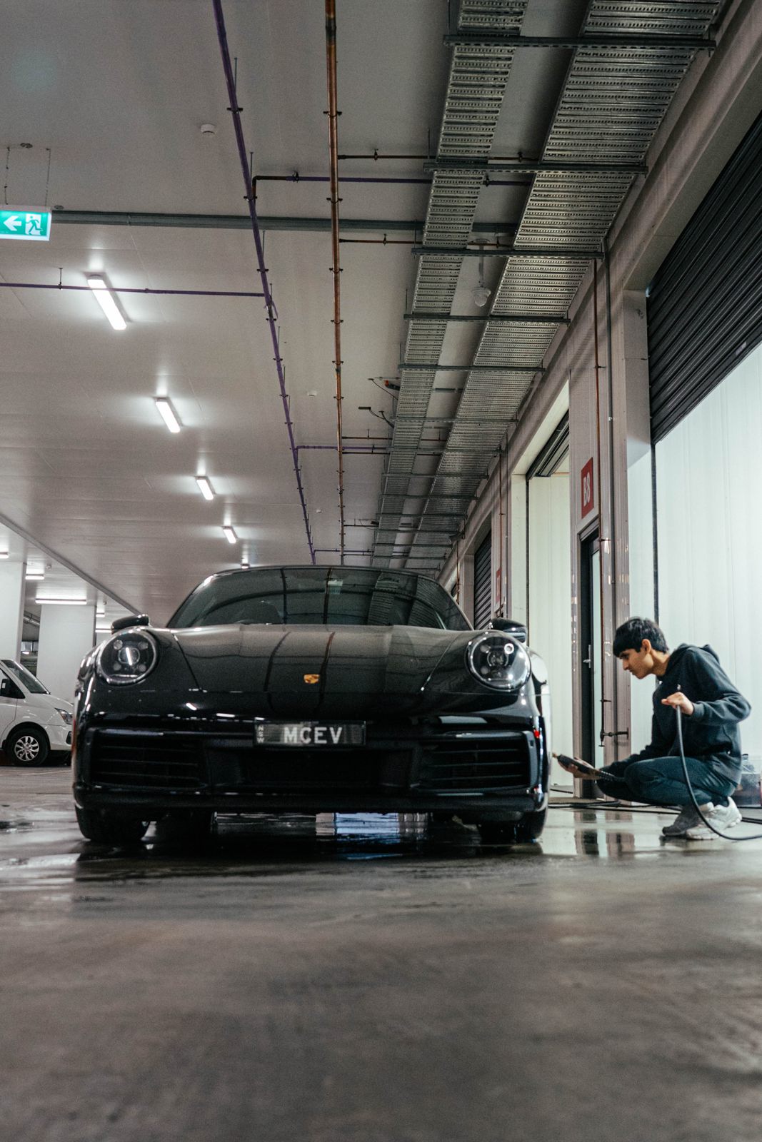 Detailing a Porsche in an underground garage