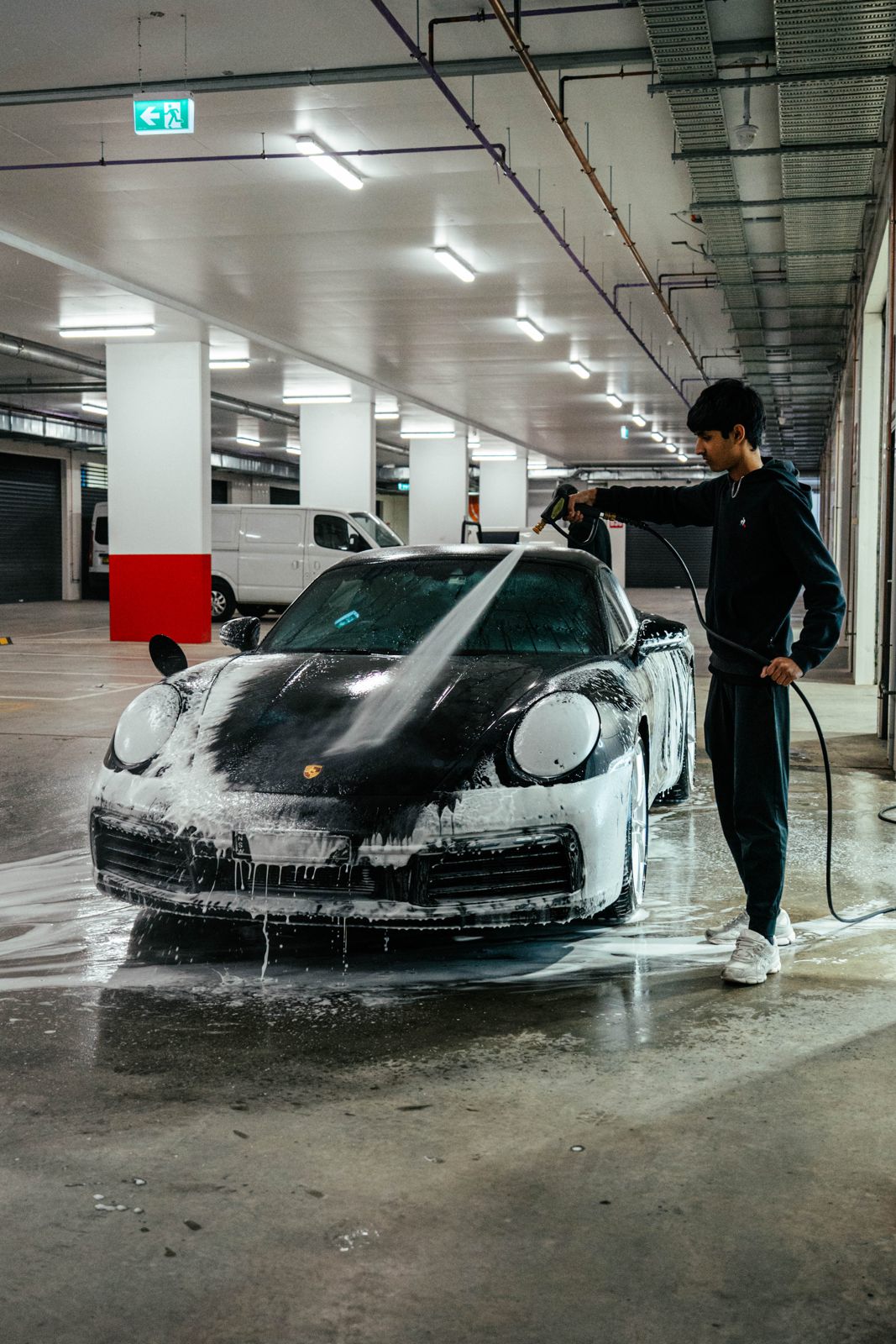 Porsche 911 being foam washed at Fine Detailing Co
