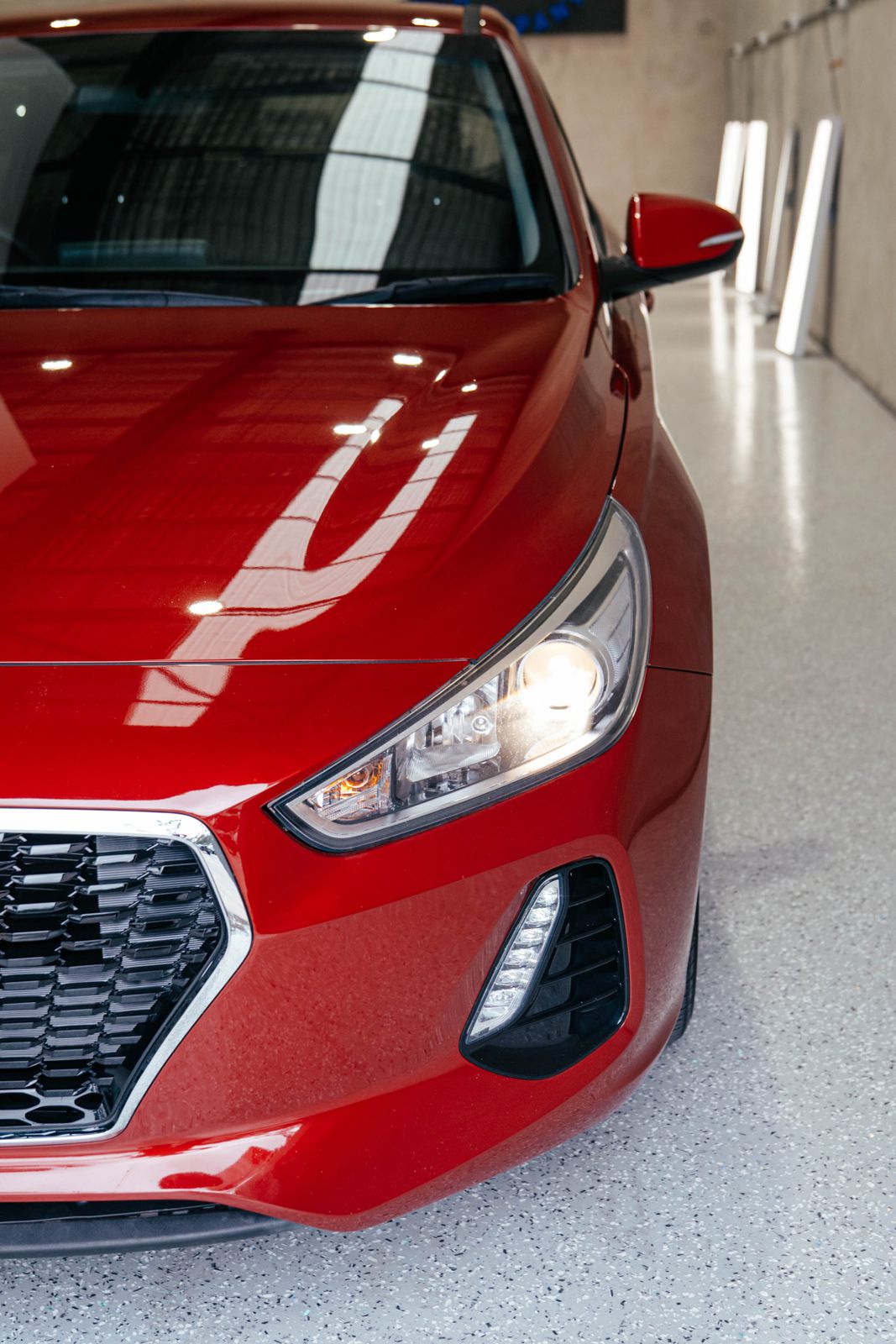 Red Hyundai i30 headlight detail